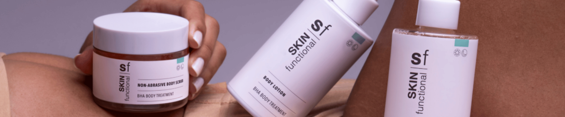 Skincare products including a jar, bottle, and tube on a neutral background