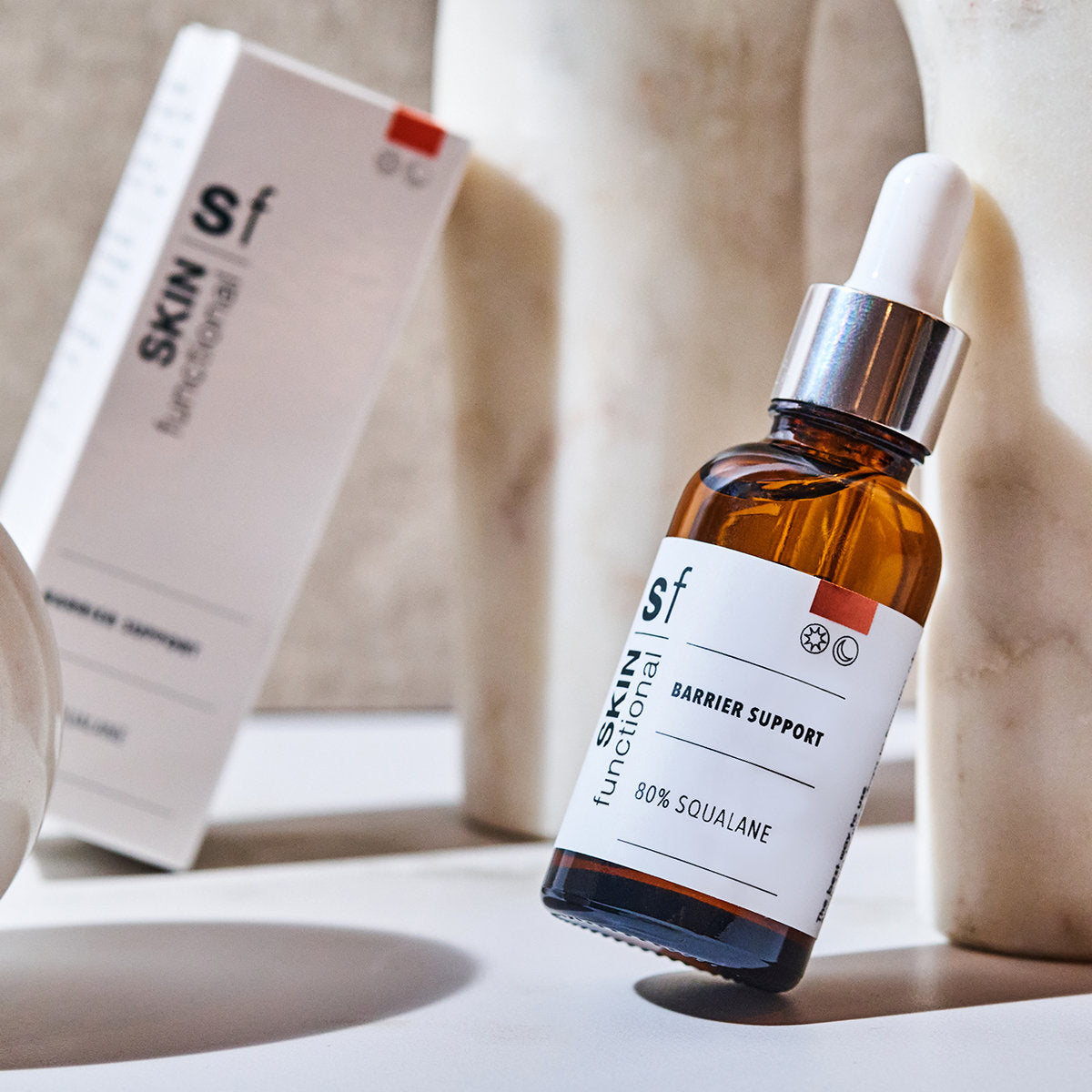 SKIN Functional carrier support skin treatment with details skincare product on a grey background