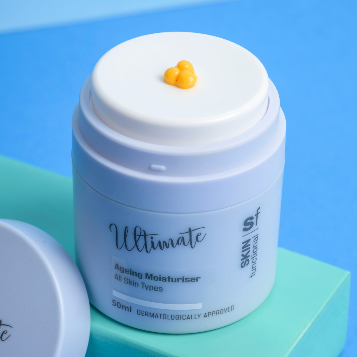 Skin Functional Ageing Treatment Tonic Moisturiser Skincare product bottle with packaging and background