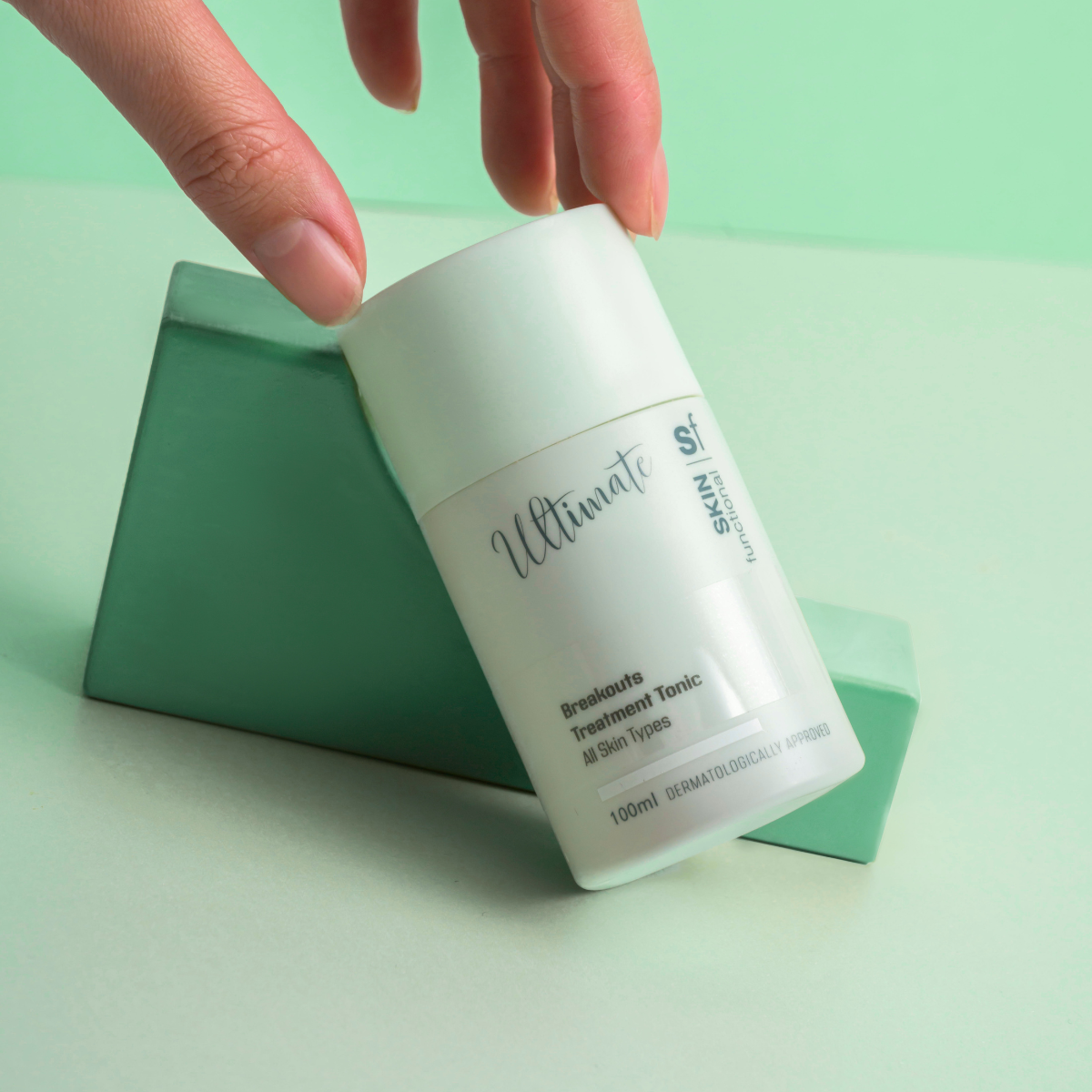 Skin Functional Breakouts Treatment Tonic Skincare product bottle with packaging and background