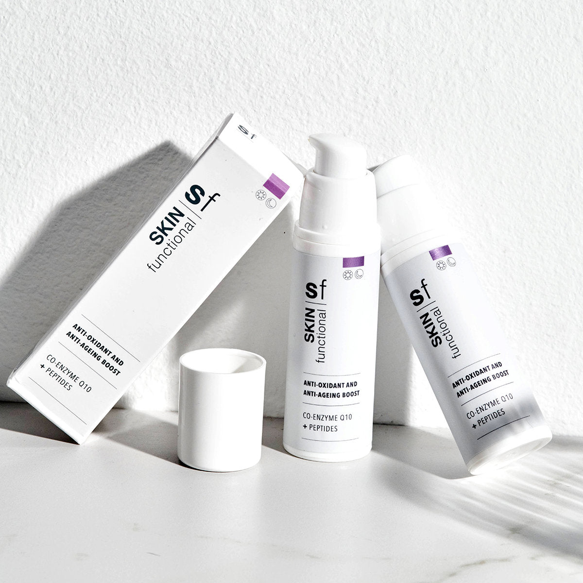 SKIN Functional Anti-Oxident and Anti-Ageing Boost with product details skincare product on a light gray background