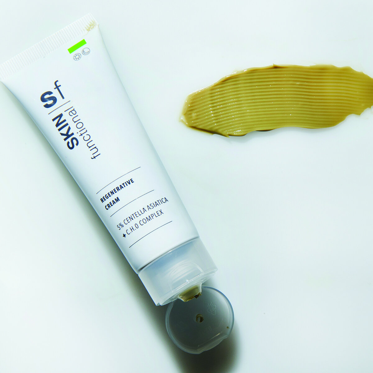 SKIN Functional Regenerative Cream with details skincare product on a light gray background